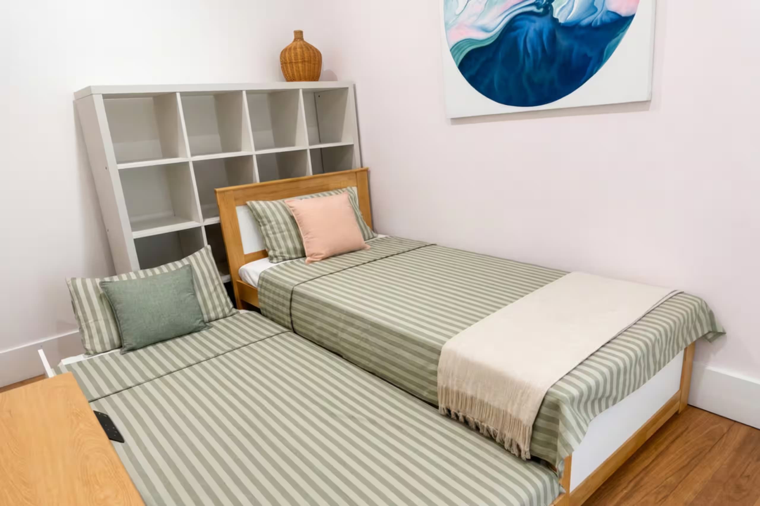 The trundle bed pulls out into two single beds, adding flexible sleeping space for larger groups
