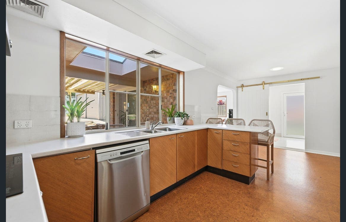 Dining zone adjacent to living spaces
